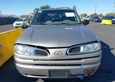 2002 Oldsmobile Bravada из США, поврежденный, VIN 1GHDT13S722128362